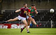 22 May 2021; Jordan Flynn of Mayo in action against Kevin Maguire of Westmeath during the Allianz Football League Division 2 North Round 2 match between Westmeath and Mayo at TEG Cusack Park in Mullingar, Westmeath. Photo by Stephen McCarthy/Sportsfile