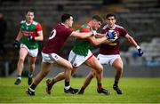 22 May 2021; Jordan Flynn of Mayo in action against David Lynch of Westmeath during the Allianz Football League Division 2 North Round 2 match between Westmeath and Mayo at TEG Cusack Park in Mullingar, Westmeath. Photo by Stephen McCarthy/Sportsfile