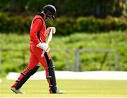 22 May 2021; Seamus Lynch of Munster Reds walks after being caught out by Kevin O'Brien of Leinster Lighting during the Cricket Ireland InterProvincial Cup 2021 match between Munster Reds and Leinster Lightning at Pembroke Cricket Club in Dublin. Photo by Harry Murphy/Sportsfile
