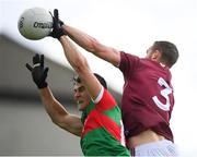 22 May 2021; Tommy Conroy of Mayo in action against Kevin Maguire of Westmeath during the Allianz Football League Division 2 North Round 2 match between Westmeath and Mayo at TEG Cusack Park in Mullingar, Westmeath. Photo by Stephen McCarthy/Sportsfile
