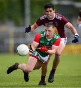 22 May 2021; Ryan O'Donoghue of Mayo in action against Denis Corroon of Westmeath during the Allianz Football League Division 2 North Round 2 match between Westmeath and Mayo at TEG Cusack Park in Mullingar, Westmeath. Photo by Stephen McCarthy/Sportsfile