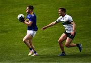 22 May 2021; Conor Byrne of Wicklow in action against Colm O'Shaughnessy of Tipperary during the Allianz Football League Division 3 South Round 2 match between Tipperary and Wicklow at Semple Stadium in Thurles, Tipperary. Photo by Ray McManus/Sportsfile