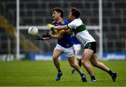22 May 2021; Oisín Manning of Wicklow in action against Jack Harney of Tipperary during the Allianz Football League Division 3 South Round 2 match between Tipperary and Wicklow at Semple Stadium in Thurles, Tipperary. Photo by Ray McManus/Sportsfile