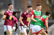 22 May 2021; James Dolan, 5, and Sam McCartan of Westmeath celebrate winning a free during the Allianz Football League Division 2 North Round 2 match between Westmeath and Mayo at TEG Cusack Park in Mullingar, Westmeath. Photo by Stephen McCarthy/Sportsfile