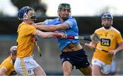 22 May 2021; Chris Crummey of Dublin is tackled by Damon McMullan of Antrim during the Allianz Hurling League Division 1 Round 3 match between Dublin and Antrim in Parnell Park in Dublin. Photo by Brendan Moran/Sportsfile