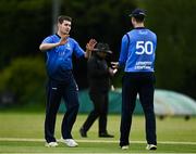 22 May 2021; Josh Little of Leinster Lighting, left, celebrates with George Dockrell after taking the wicket of Amish Sidhu of Munster Reds during the Cricket Ireland InterProvincial Cup 2021 match between Munster Reds and Leinster Lightning at Pembroke Cricket Club in Dublin. Photo by Harry Murphy/Sportsfile
