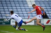 22 May 2021; Sean White of Cork shoots to score his side's first goal, past Laois goalkeeper Niall Corbet, during the Allianz Football League Division 2 South Round 2 match between Laois and Cork at MW Hire O'Moore Park in Portlaoise, Laois. Photo by Seb Daly/Sportsfile
