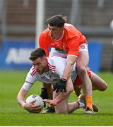 22 May 2021; Declan McClure of Tyrone in action against Connaire Mackin of Armagh during the Allianz Football League Division 1 North Round 2 match between Armagh and Tyrone at Athletic Grounds in Armagh. Photo by Ramsey Cardy/Sportsfile