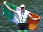23 May 2021; Sanita Puspure of Ireland celebrates with her bronze medal after victory in the Women’s Single Sculls A Final during day three of the FISA World Cup Rowing II at Lake Gottersee in Lucerne, Switzerland. Photo by Roberto Bregani/Sportsfile