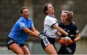 23 May 2021; Eimear Fennell of Waterford in action against Dublin goalkeeper Abby Sheils and Laura McGinley of Dublin during the Lidl Ladies Football National League Division 1B Round 1 match between Dublin and Waterford at Parnell Park in Dublin. Photo by Ben McShane/Sportsfile