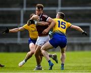 23 May 2021; Paul Conroy of Galway in action against Cathal Cregg, right, and Eddie Nolan of Roscommon during the Allianz Football League Division 1 South Round 2 match between Galway and Roscommon at Pearse Stadium in Galway. Photo by Harry Murphy/Sportsfile