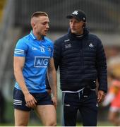 23 May 2021; Interim Dublin manager Mick Galvin talking to Paddy Small of Dublin as they leave the field, for half time, during the Allianz Football League Division 1 South Round 2 match between Dublin and Kerry at Semple Stadium in Thurles, Tipperary. Photo by Ray McManus/Sportsfile