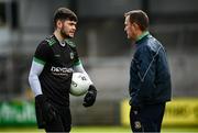23 May 2021; Meath goalkeeper Harry Hogan speaks with manager Andy McEntee before the Allianz Football League Division 2 North Round 2 match between Down and Meath at Athletic Grounds in Armagh. Photo by David Fitzgerald/Sportsfile