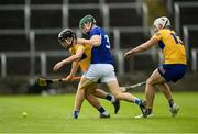 23 May 2021; David Reidy, left, and Aron Shanagher of Clare in action against Seán Downey of Laois during the Allianz Hurling League Division 1 Group B Round 3 match between Laois and Clare at MW Hire O'Moore Park in Portlaoise, Laois. Photo by Piaras Ó Mídheach/Sportsfile