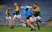 23 May 2021; Brian Fenton of Dublin is tackled by Micheál Burns of Kerry during the Allianz Football League Division 1 South Round 2 match between Dublin and Kerry at Semple Stadium in Thurles, Tipperary. Photo by Stephen McCarthy/Sportsfile