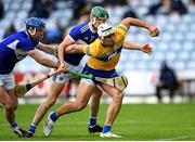 23 May 2021; Aron Shanagher of Clare in action against Seán Downey, and Jack Kelly, behind, of Laois during the Allianz Hurling League Division 1 Group B Round 3 match between Laois and Clare at MW Hire O'Moore Park in Portlaoise, Laois. Photo by Piaras Ó Mídheach/Sportsfile