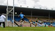23 May 2021; Con O'Callaghan of Dublin palms the ball against the post watched by Paul Murphy of Kerry during the opening moments of the Allianz Football League Division 1 South Round 2 match between Dublin and Kerry at Semple Stadium in Thurles, Tipperary. Photo by Stephen McCarthy/Sportsfile