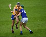 23 May 2021; Cathal Malone of Clare in action against Ciarán Collier of Laois during the Allianz Hurling League Division 1 Group B Round 3 match between Laois and Clare at MW Hire O'Moore Park in Portlaoise, Laois. Photo by Piaras Ó Mídheach/Sportsfile