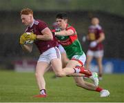 22 May 2021; Ronan Wallace of Westmeath in action against Conor Loftus of Mayo during the Allianz Football League Division 2 North Round 2 match between Westmeath and Mayo at TEG Cusack Park in Mullingar, Westmeath. Photo by Stephen McCarthy/Sportsfile
