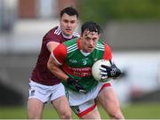 22 May 2021; Diarmuid O'Connor of Mayo in action against David Lynch of Westmeath during the Allianz Football League Division 2 North Round 2 match between Westmeath and Mayo at TEG Cusack Park in Mullingar, Westmeath. Photo by Stephen McCarthy/Sportsfile