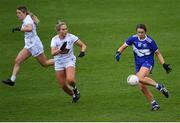 23 May 2021; Anna Healy of Laois shoots as Lara Gilbert of Kildare closes in during the Lidl Ladies Football National League Division 3B Round 1 match between Laois and Kildare at MW Hire O'Moore Park in Portlaoise, Laois. Photo by Piaras Ó Mídheach/Sportsfile