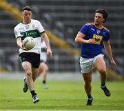 22 May 2021; Shane Foley of Tipperary in action against Ross O'Brien of Wicklow during the Allianz Football League Division 3 South Round 2 match between Tipperary and Wicklow at Semple Stadium in Thurles, Tipperary. Photo by Ray McManus/Sportsfile