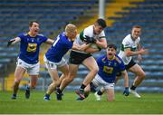 22 May 2021; Sean O'Connor of Tipperary breaks clear of Wicklow players Niall Donnolly, 6, Mark Kenny, 11, and Oisín Manning during the Allianz Football League Division 3 South Round 2 match between Tipperary and Wicklow at Semple Stadium in Thurles, Tipperary. Photo by Ray McManus/Sportsfile