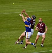 22 May 2021; John McGrath of Tipperary in action against Aidan Harte of Galway as Galway's TJ Brennan awaits developments during the Allianz Hurling League Division 1 Group A Round 3 match between Tipperary and Galway at Semple Stadium in Thurles, Tipperary. Photo by Ray McManus/Sportsfile