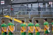 22 May 2021; Spectators outside the ground stand for Amhrán na bhFiann before the Allianz Football League Division 1 North Round 2 match between Donegal and Monaghan at MacCumhaill Park in Ballybofey, Donegal. Photo by Piaras Ó Mídheach/Sportsfile