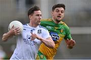 22 May 2021; Karl O'Connell of Monaghan in action against Daire Ó Baoill of Donegal during the Allianz Football League Division 1 North Round 2 match between Donegal and Monaghan at MacCumhaill Park in Ballybofey, Donegal. Photo by Piaras Ó Mídheach/Sportsfile