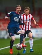 24 May 2021; Ian Bermingham of St Patrick's Athletic in action against Ronan Boyce of Derry City during the SSE Airtricity League Premier Division match between Derry City and St Patrick's Athletic at Ryan McBride Brandywell Stadium in Derry. Photo by David Fitzgerald/Sportsfile