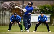 25 May 2021; William Porterfield of North West Warriors hits a six during the Cricket Ireland InterProvincial Cup 2021 match between North West Warriors and Leinster Lightning at Eglinton Cricket Club in Derry. Photo by David Fitzgerald/Sportsfile