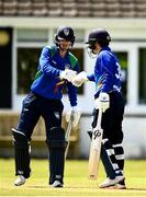 25 May 2021; Andy McBrine, right, of North West Warriors is congratulated by team-mate Graham Kennedy after making 50 runs during the Cricket Ireland InterProvincial Cup 2021 match between North West Warriors and Leinster Lightning at Eglinton Cricket Club in Derry. Photo by David Fitzgerald/Sportsfile