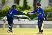 25 May 2021; Andy McBrine, left, and Nathan McGuire of North West Warriors celebrate during the Cricket Ireland InterProvincial Cup 2021 match between North West Warriors and Leinster Lightning at Eglinton Cricket Club in Derry. Photo by David Fitzgerald/Sportsfile