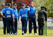 25 May 2021; David O'Halloran of Leinster Lightning, right, is congratulated by team-mates after his fourth wicket during the Cricket Ireland InterProvincial Cup 2021 match between North West Warriors and Leinster Lightning at Eglinton Cricket Club in Derry. Photo by David Fitzgerald/Sportsfile