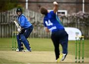 25 May 2021; Craig Young of North West Warriors bowls to Kevin O'Brien of Leinster Lightning during the Cricket Ireland InterProvincial Cup 2021 match between North West Warriors and Leinster Lightning at Eglinton Cricket Club in Derry. Photo by David Fitzgerald/Sportsfile