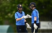 25 May 2021; Andrew Balbirnie, left, and George Dockrell of Leinster Lightning fist bump during the Cricket Ireland InterProvincial Cup 2021 match between North West Warriors and Leinster Lightning at Eglinton Cricket Club in Derry. Photo by David Fitzgerald/Sportsfile