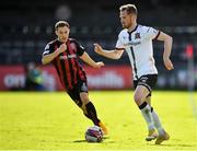 24 May 2021; Cameron Dummigan of Dundalk in action against Liam Burt of Bohemians during the SSE Airtricity League Premier Division match between Bohemians and Dundalk at Dalymount Park in Dublin. Photo by Seb Daly/Sportsfile