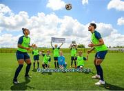 26 May 2021; Republic of Ireland internationals Rianna Jarrett and Andrew Omobamidele with, from left, Liadan Kelly, age 10, Liam White, age 9, Stella Toomey, age 9, Ross Ward, age 7, Joshua Ward, age 9, and Morgan Coffey, age 8, during the launch of the INTERSPORT Elverys FAI Summer Soccer Schools at the FAI National Training Centre in Abbotstown, Dublin. The Football Association of Ireland launched the 25th edition of the hugely popular FAI Summer Soccer Schools in partnership with our title sponsor, the leading Irish sports retailer INTERSPORT Elverys. Republic of Ireland players Rianna Jarrett and Andrew Omobamidele were on hand for the launch of the hugely popular programme which will see the INTERSPORT Elverys FAI Summer Soccer Schools return to clubs across Ireland in July and August. The INTERSPORT Elverys FAI Summer Soccer Schools cater for boys and girls aged 6 to 14 in a fun and inclusive environment. Photo by Stephen McCarthy/Sportsfile