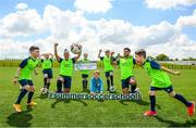 26 May 2021; Republic of Ireland internationals Rianna Jarrett and Andrew Omobamidele with, from left, Liam White, age 9, Liadan Kelly, age 10, Stella Toomey, age 9, Ross Ward, age 7, and Morgan Coffey, age 8, during the launch of the INTERSPORT Elverys FAI Summer Soccer Schools at the FAI National Training Centre in Abbotstown, Dublin. The Football Association of Ireland launched the 25th edition of the hugely popular FAI Summer Soccer Schools in partnership with our title sponsor, the leading Irish sports retailer INTERSPORT Elverys. Republic of Ireland players Rianna Jarrett and Andrew Omobamidele were on hand for the launch of the hugely popular programme which will see the INTERSPORT Elverys FAI Summer Soccer Schools return to clubs across Ireland in July and August. The INTERSPORT Elverys FAI Summer Soccer Schools cater for boys and girls aged 6 to 14 in a fun and inclusive environment. Photo by Stephen McCarthy/Sportsfile