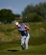 27 May 2021; James Sugrue of Ireland chips onto the 5th green during day one of the Irish Challenge Golf at Portmarnock Golf Links in Dublin. Photo by Ramsey Cardy/Sportsfile