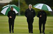 27 May 2021; Match referee Kevin Gallagher, centre, inspects the pitch with umpires Paul Reynolds, left, and Mark Hawthorne during the Cricket Ireland InterProvincial Cup 2021 match between Munster Reds and Northern Knights at Pembroke Cricket Club in Dublin. Photo by Harry Murphy/Sportsfile