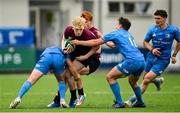 28 May 2021; Jamie Osborne of Ireland U20 in action against David Hawkshaw, left, and Tim Corkery of Leinster A during the match between Ireland U20 and Leinster A at Energia Park in Dublin. Photo by Ramsey Cardy/Sportsfile