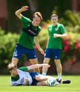 28 May 2021; Luca Connell is tackled by Ryan Johansson during a Republic of Ireland U21 training session in Marbella, Spain. Photo by Stephen McCarthy/Sportsfile