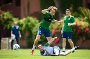 28 May 2021; Luca Connell is tackled by Ryan Johansson during a Republic of Ireland U21 training session in Marbella, Spain. Photo by Stephen McCarthy/Sportsfile