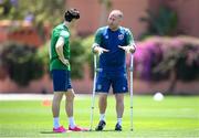 28 May 2021; Coach Alan Reynolds speaks to Louie Watson during a Republic of Ireland U21 training session in Marbella, Spain. Photo by Stephen McCarthy/Sportsfile