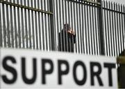 28 May 2021; A supporter looks on from outside the ground during the SSE Airtricity League Premier Division match between Finn Harps and Sligo Rovers at Finn Park in Ballybofey, Donegal. Photo by David Fitzgerald/Sportsfile