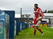 28 May 2021; Lewis Banks of Sligo Rovers, centre, celebrates after scoring his side's second goal with team-mate Mark Byrne during the SSE Airtricity League Premier Division match between Finn Harps and Sligo Rovers at Finn Park in Ballybofey, Donegal. Photo by David Fitzgerald/Sportsfile