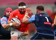 28 May 2021; James Cronin of Munster is tackled by Cory Hill and Corey Domachowski, 1, of Cardiff Blues during the Guinness PRO14 Rainbow Cup match between Munster and Cardiff Blues at Thomond Park in Limerick. Photo by Piaras Ó Mídheach/Sportsfile