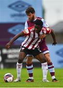 28 May 2021; James Akintunde of Derry City in action against Gary Deegan of Drogheda United during the SSE Airtricity League Premier Division match between Drogheda United and Derry City at Head in the Game Park in Drogheda, Louth. Photo by Eóin Noonan/Sportsfile